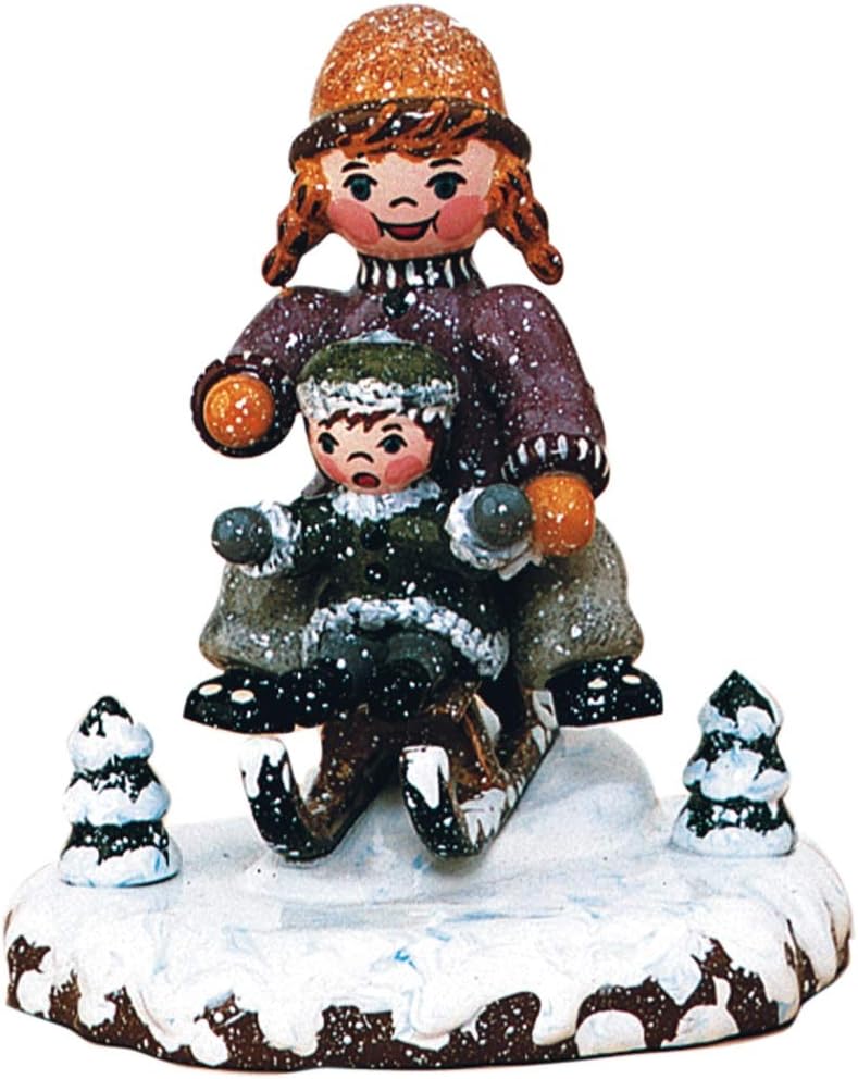 Winterkinder "Schlittenfahrerin"