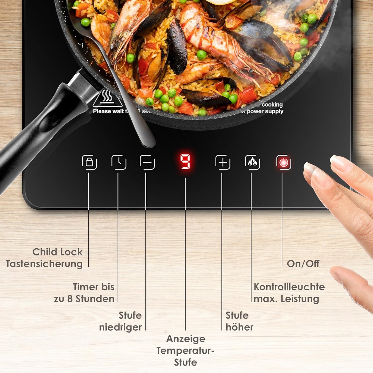 Induktionskochplatte mit Rezeptbuch und Mikrofasertüchern