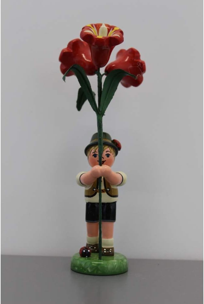 Blumenkind Junge mit Amarylis