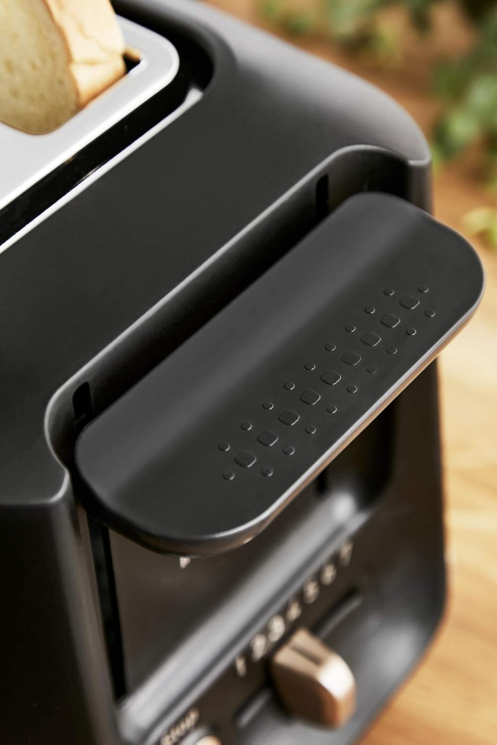 Toaster mit Magnetklammern und Krümelschublade