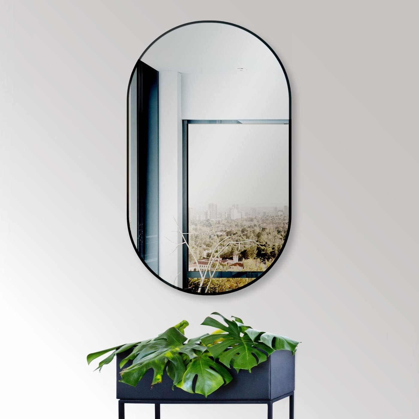 Ovaler Wandspiegel mit Metallrahmen, Schwarz 75x45cm oval