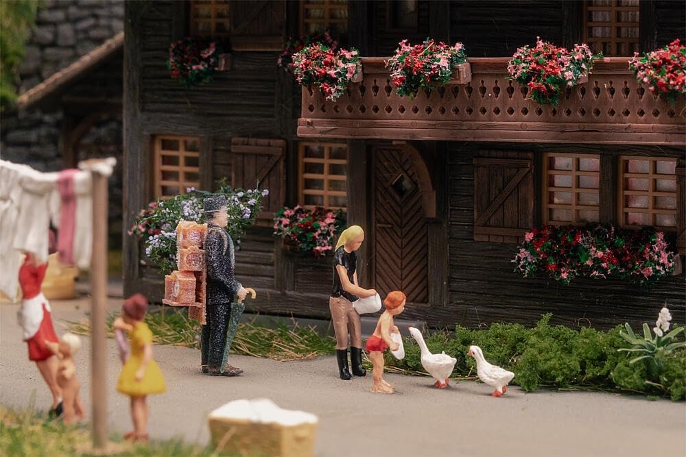 Jubiläumsmodell Uhrenmacherhaus mit Figur