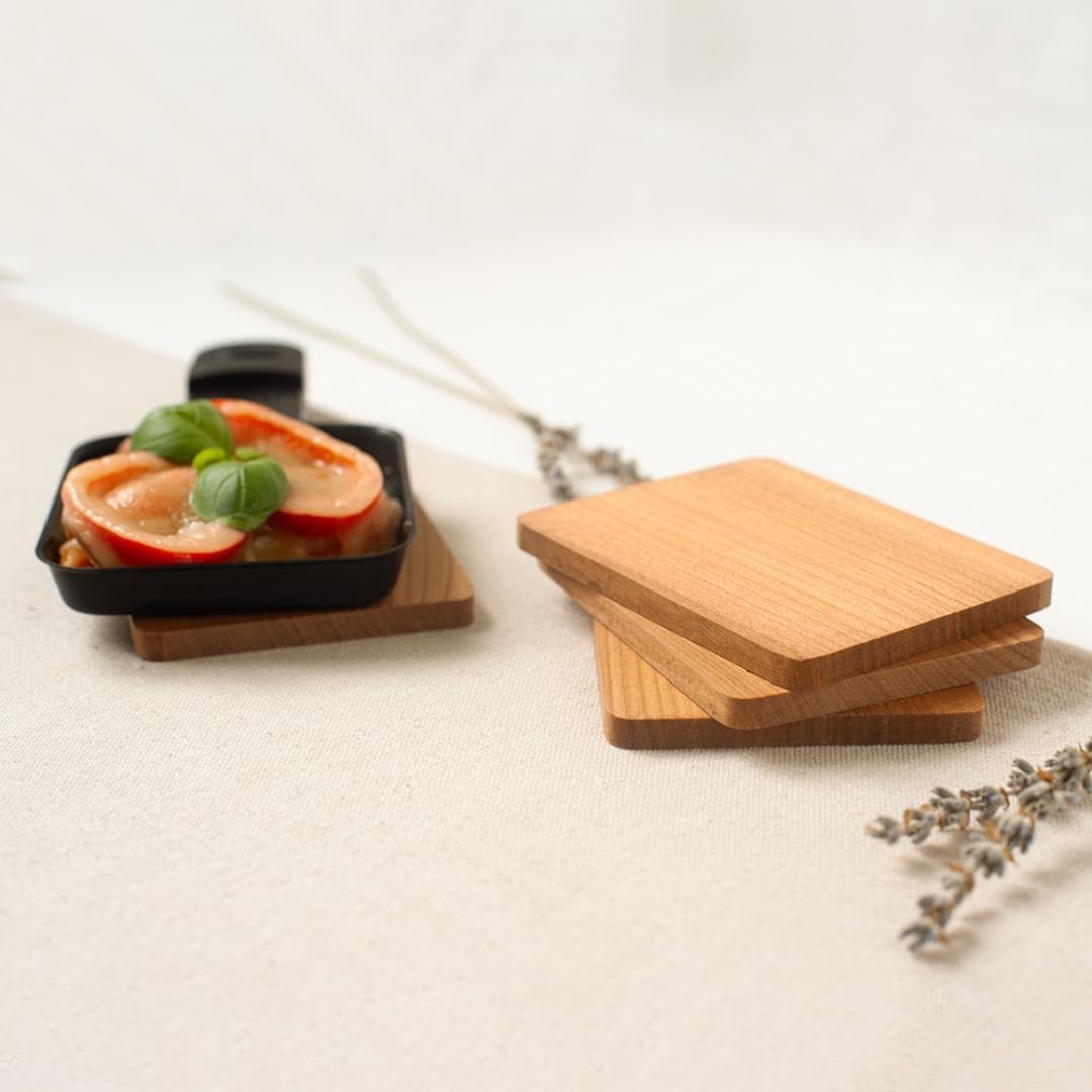 Raclette-Set aus Kirschholz Brettchen und Raclette-Schaber