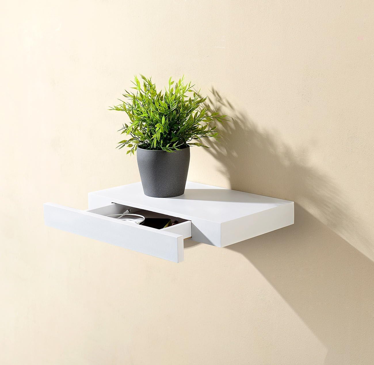 Wandregal mit versteckter Schublade