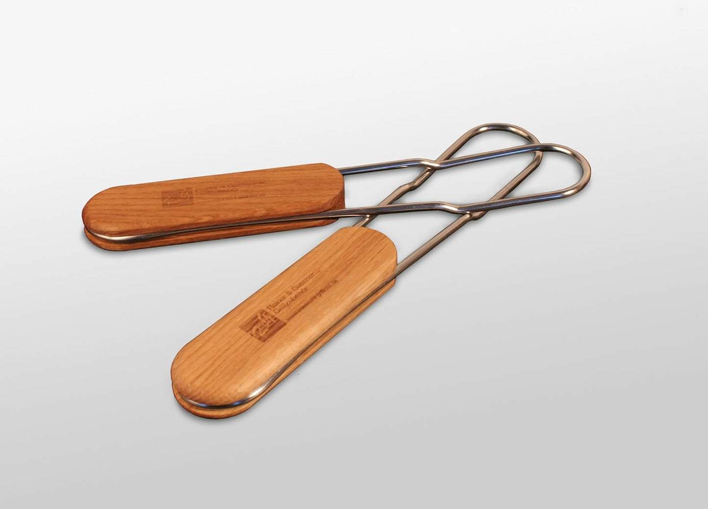 Grillrost mit abnehmbaren Handgriffen