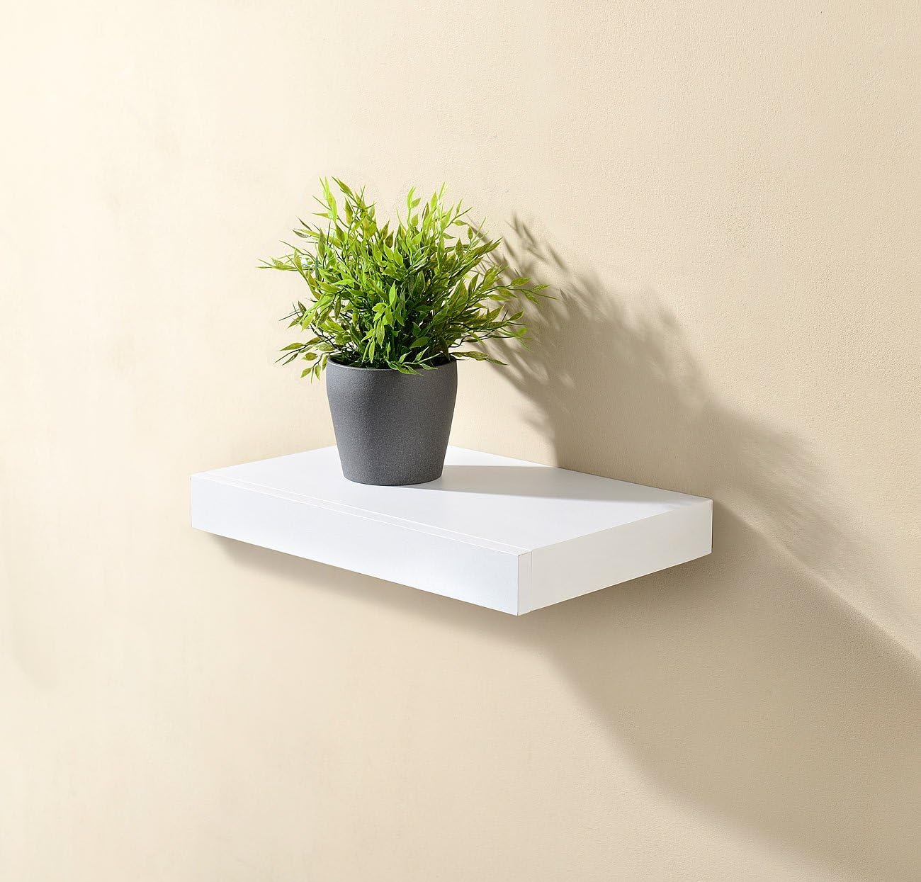 Wandregal mit versteckter Schublade