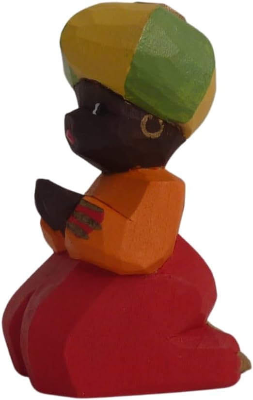 Kniende Krippenfigur mit Beutel