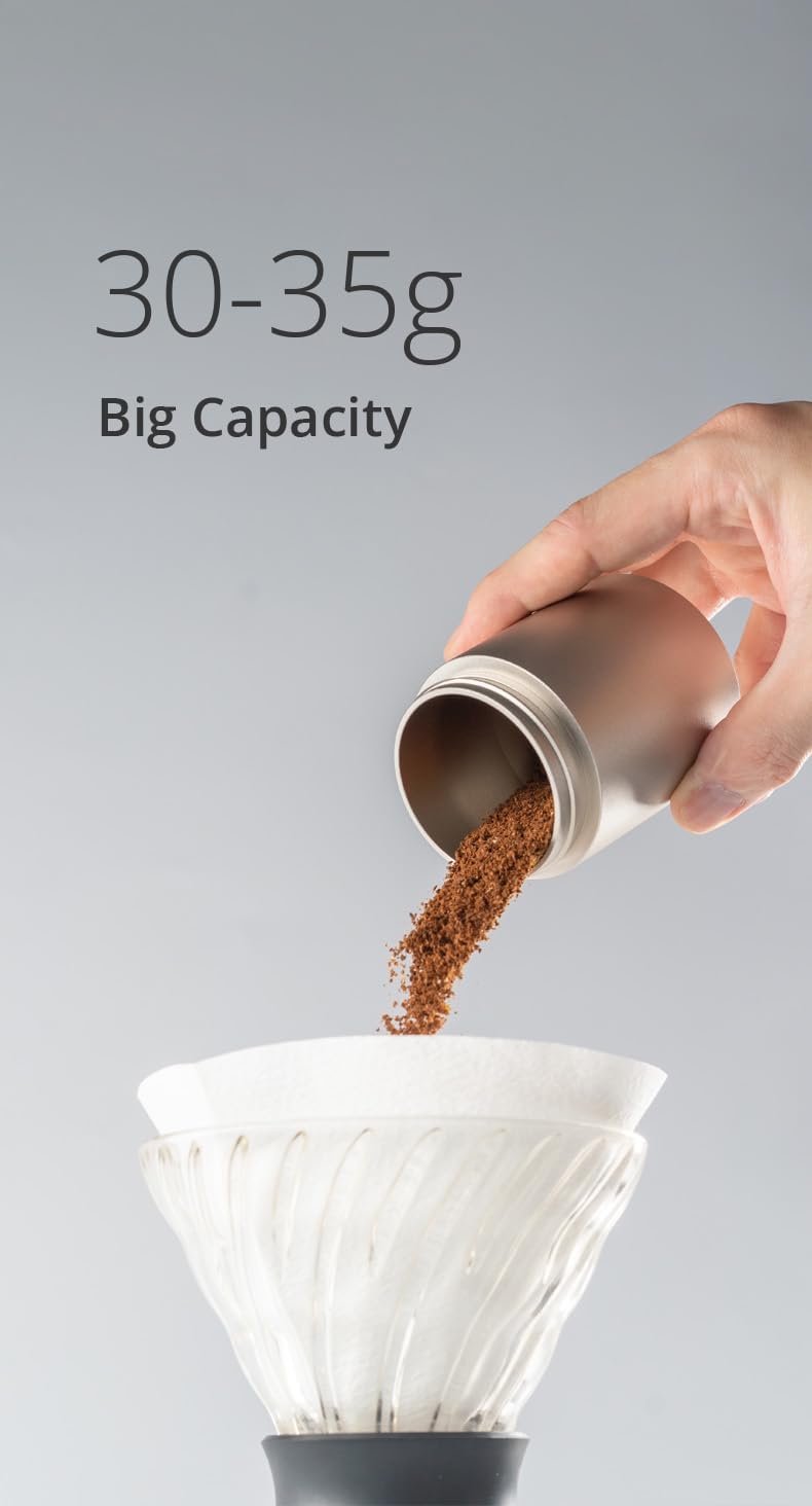 Hand-Kaffeemühle, J