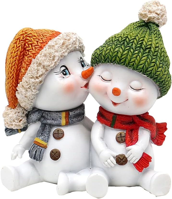 Schneekinderpaar mit Mütze und Schal, Kuss