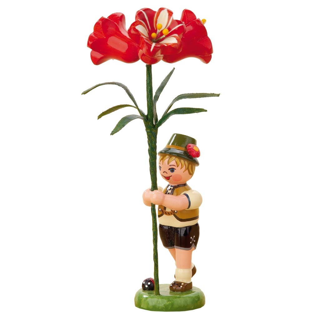 Blumenkind Junge mit Amarylis